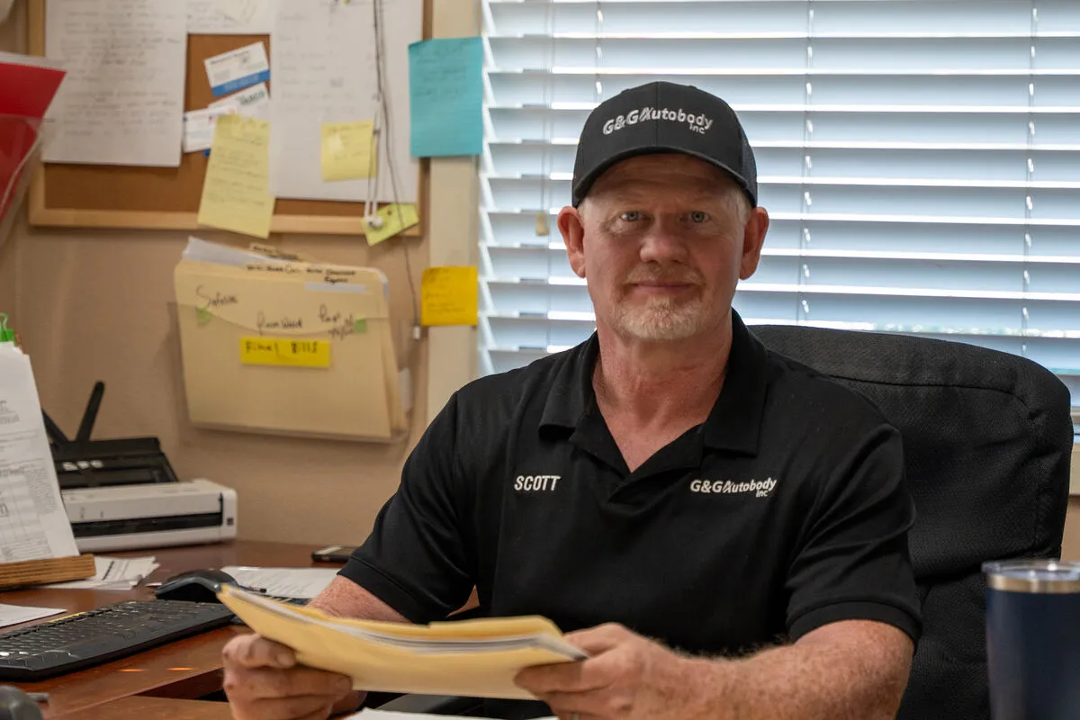 Auto body repair in progress - professional paint booth work